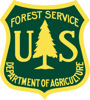 US Forest Service badge with tree symbol and yellow text on green background.