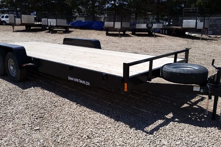 a bench is sitting in a parking lot