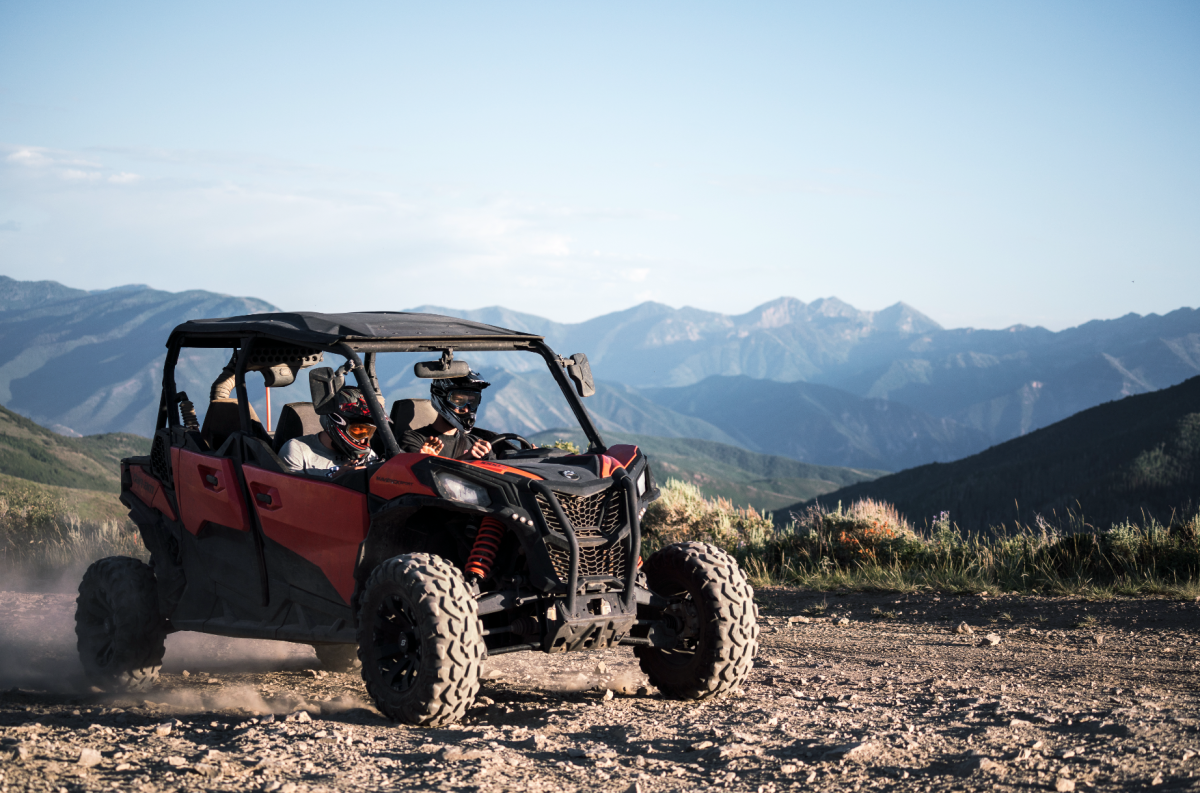 a truck with a mountain in the background