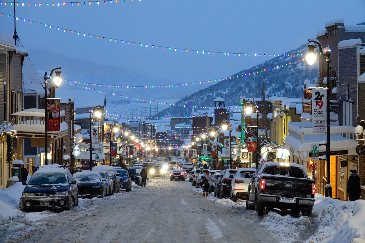 Scenic shot of the snowy main street in downtown Park City on a calm evening Scenic shot of the snowy main street in downtown of Park City, Utah on a calm winter evening around Christmas time