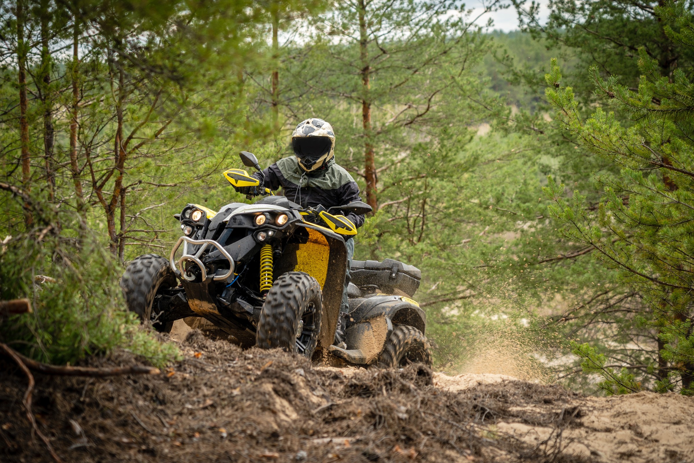 UTV riding on a dirt trail in Heber City, Utah, surrounded by rugged terrain.