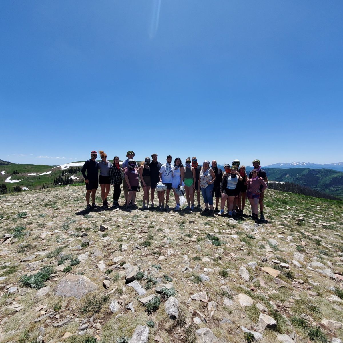A group of people standing in front of the view during a guided UTV tour in Heber City, Utah.